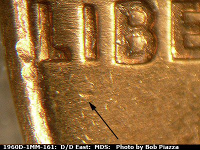 Die-stage B marker on 1960D•1MM•161 (1960 Repunched Mint Mark).