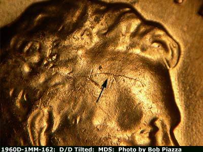 Die-stage B marker on 1960D•1MM•162 (1960 Repunched Mint Mark).