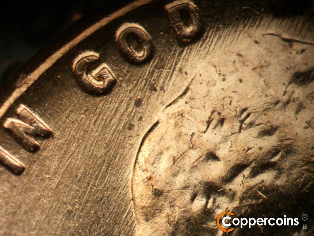 Die-stage A marker on 1960D•1MM•163 showing ENE die scratches under IN GOD.