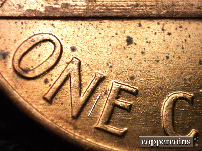 Die-stage B marker on 1960D•1MM•164 (1960 Repunched Mint Mark).