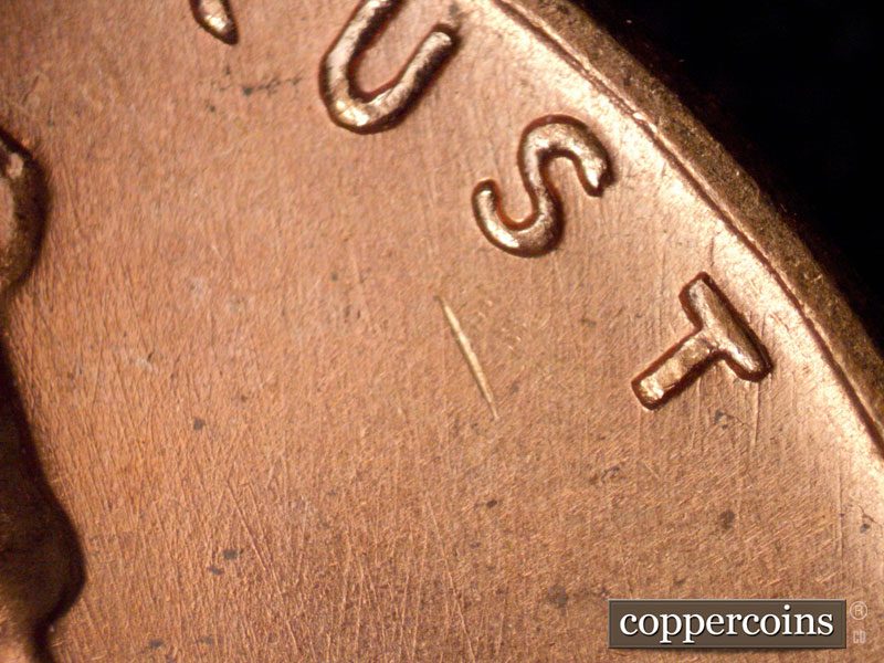 Die-stage B marker on 1960D•1MM•165 (1960 Repunched Mint Mark).