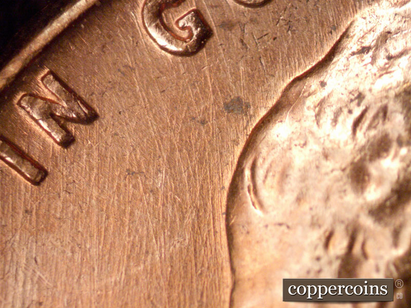 Die-stage B marker on 1960D•1MM•165 (1960 Repunched Mint Mark).
