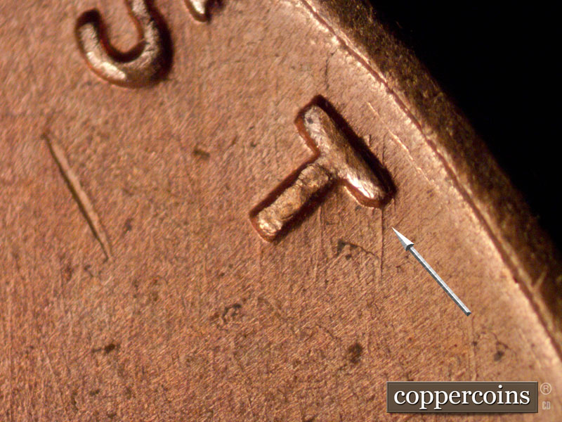 Die-stage B marker on 1960D•1MM•165 (1960 Repunched Mint Mark).