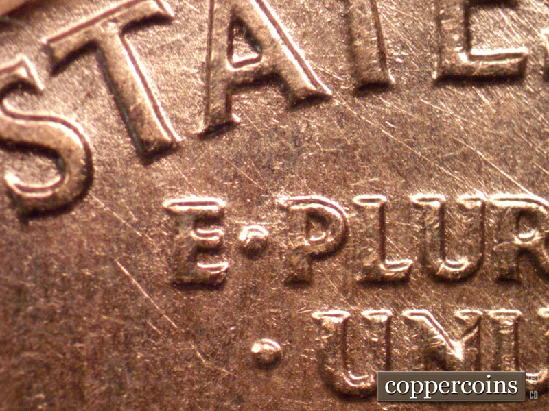 Die-stage B marker on 1960D•1MM•165 (1960 Repunched Mint Mark).