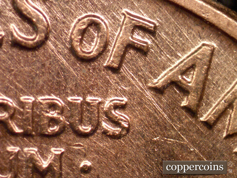 Die-stage B marker on 1960D•1MM•165 (1960 Repunched Mint Mark).