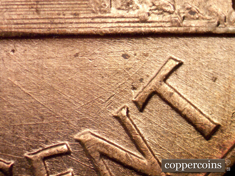 Die-stage B marker on 1960D•1MM•165 (1960 Repunched Mint Mark).
