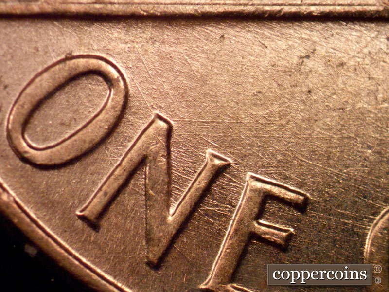 Die-stage B marker on 1960D•1MM•165 (1960 Repunched Mint Mark).
