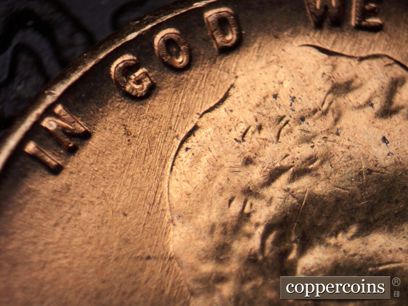 Die-stage B marker on 1960D•1MM•166 (1960 Repunched Mint Mark).