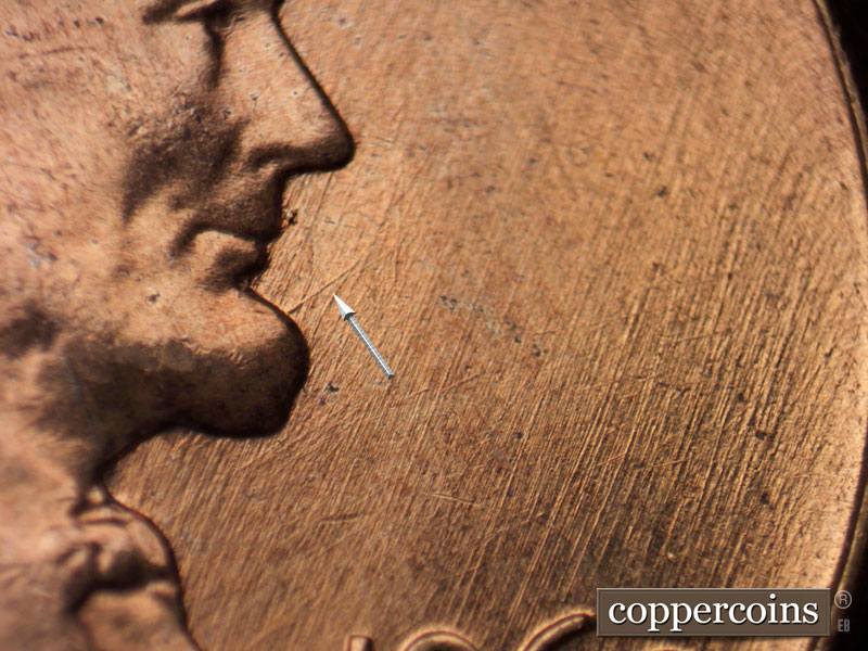 Die-stage B marker on 1960D•1MM•166 (1960 Repunched Mint Mark).