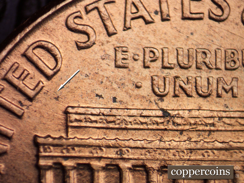Die-stage B marker on 1960D•1MM•166 (1960 Repunched Mint Mark).