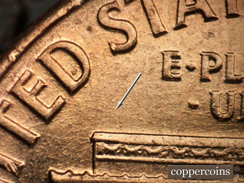 Die-stage B marker on 1960D•1MM•169 (1960 Repunched Mint Mark).