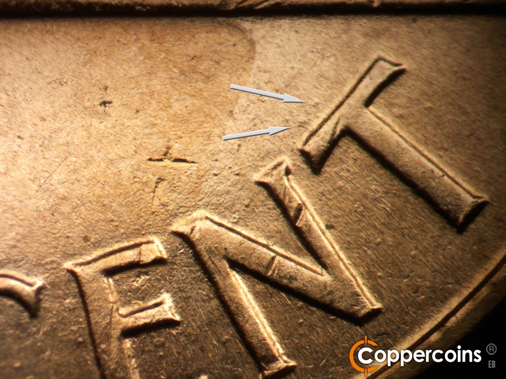 Die-stage B marker on 1960D•1MM•173 showing Two heavy die dots show consistently above the T of CENT. Other die dots show on the die, but are not as consistent.
