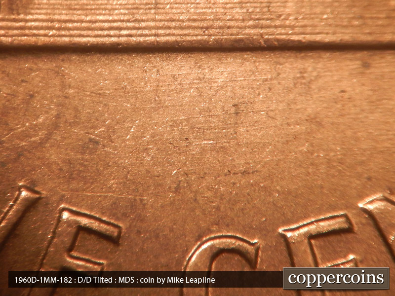 Die-stage B marker on 1960D•1MM•182 (1960 Repunched Mint Mark).