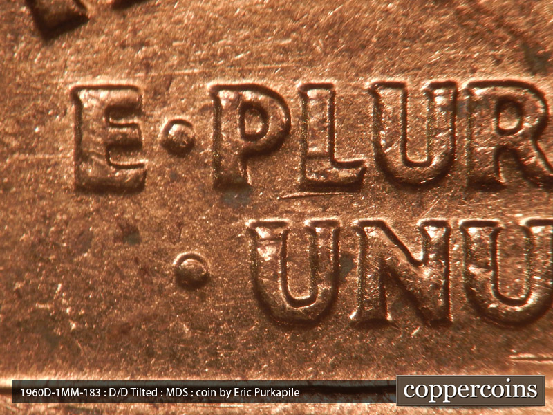 Die-stage B marker on 1960D•1MM•183 showing Deep die scratch under the L in PLURIBUS.