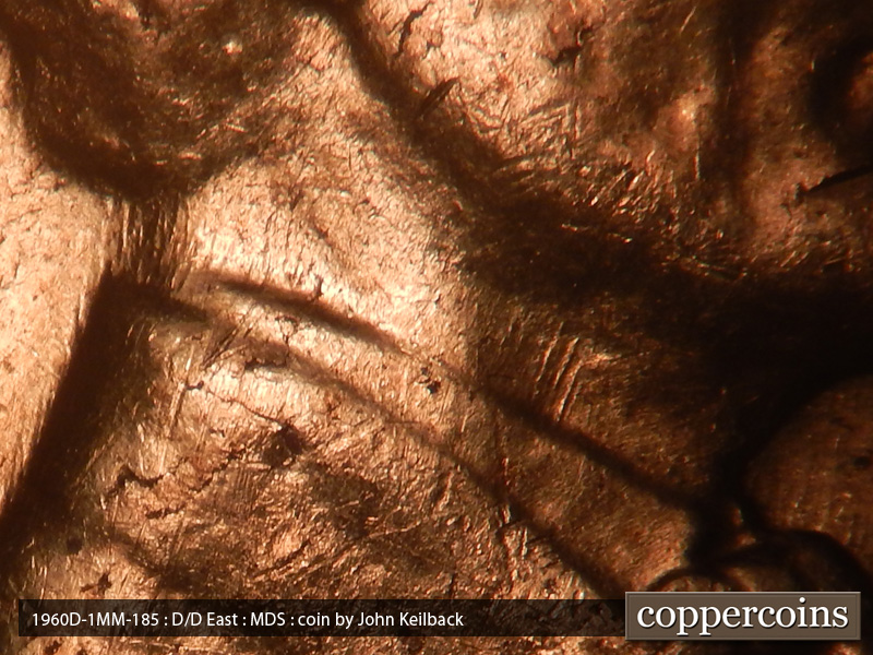 Die-stage B marker on 1960D•1MM•185 (1960 Repunched Mint Mark).