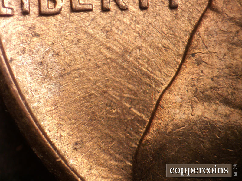 Die-stage B marker on 1960D•1MM•187 (1960 Repunched Mint Mark).