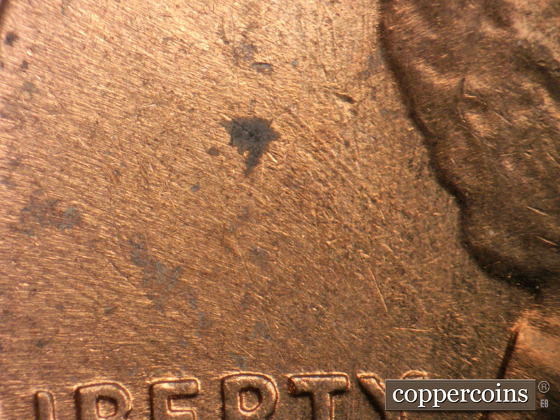 Die-stage B marker on 1960D•1MM•187 (1960 Repunched Mint Mark).