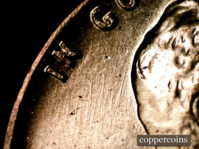 Die-stage B marker on 1960D•1MM•189 (1960 Repunched Mint Mark).