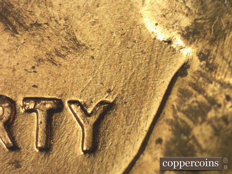 Die-stage B marker on 1960D•1MM•198 (1960 Repunched Mint Mark).