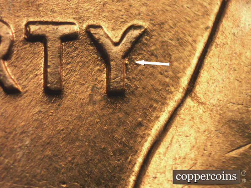 Die-stage C marker on 1960D•1MM•200 showing Die dot right next to Y in LIBERTY.