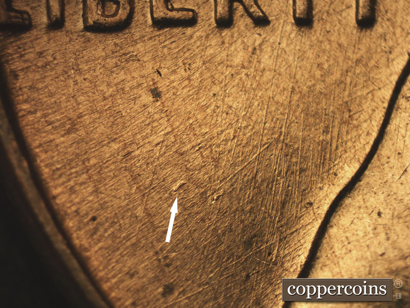 Die-stage B marker on 1960D•1MM•202 (1960 Repunched Mint Mark).