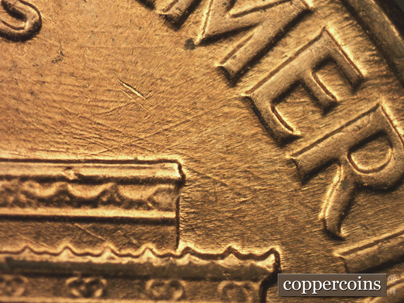 Die-stage B marker on 1960D•1MM•204 (1960 Repunched Mint Mark).