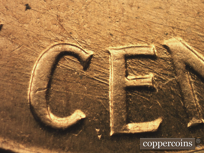 Die-stage B marker on 1960D•1MM•204 (1960 Repunched Mint Mark).