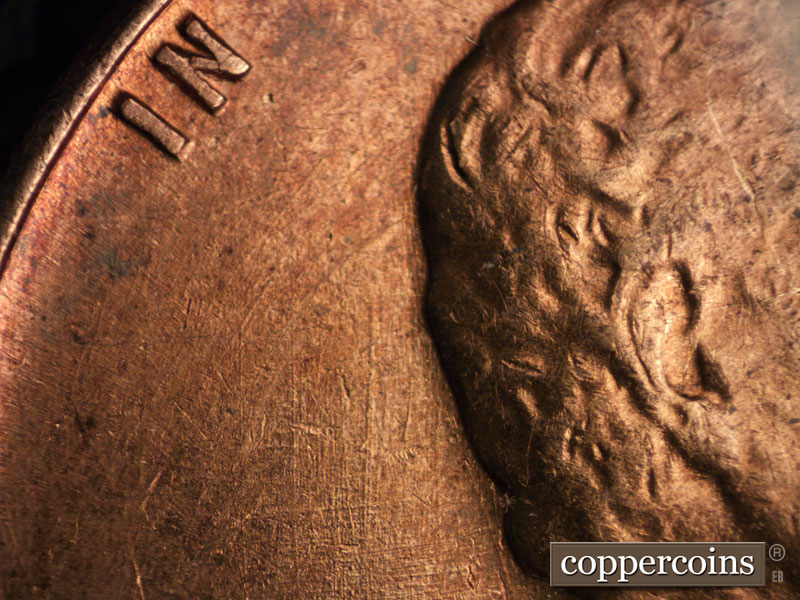 Die-stage B marker on 1960D•1MM•205 (1960 Repunched Mint Mark).