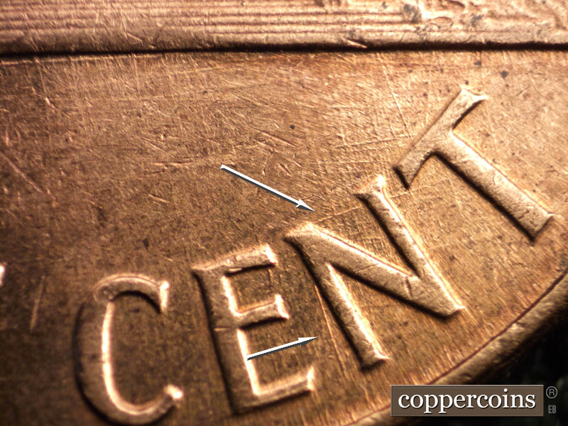 Die-stage B marker on 1960D•1MM•205 (1960 Repunched Mint Mark).