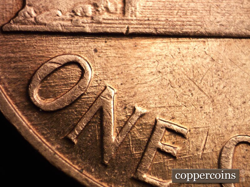 Die-stage B marker on 1960D•1MM•205 (1960 Repunched Mint Mark).