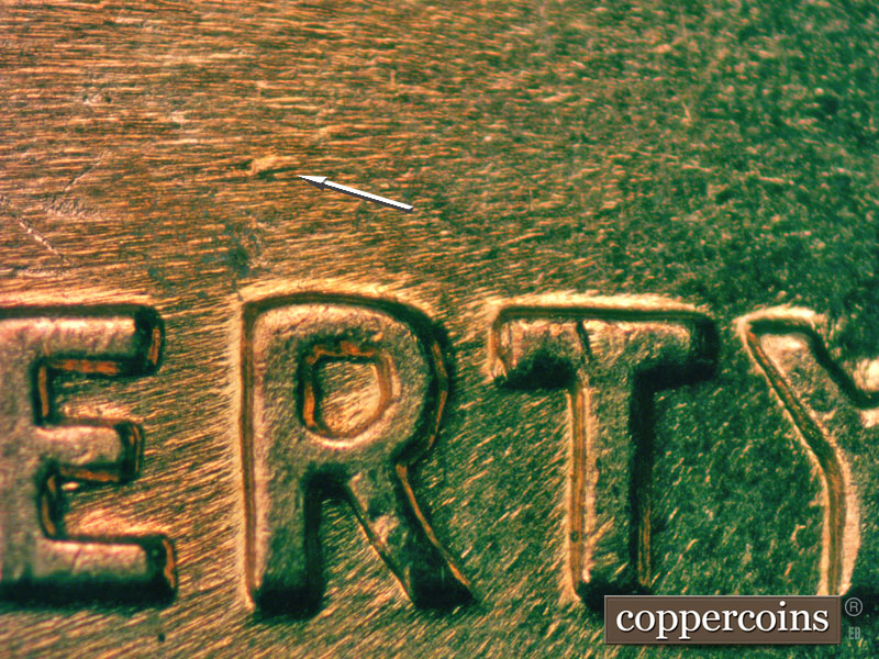Die-stage B marker on 1960D•1MM•206 (1960 Repunched Mint Mark).