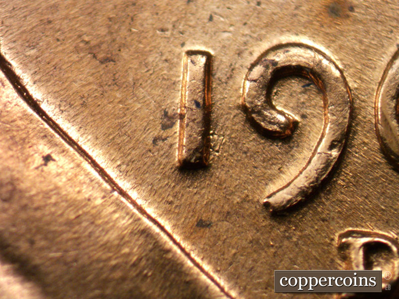 Die-stage B marker on 1960D•1MM•207 (1960 Repunched Mint Mark).