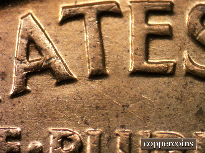 Die-stage B marker on 1960D•1MM•207 (1960 Repunched Mint Mark).