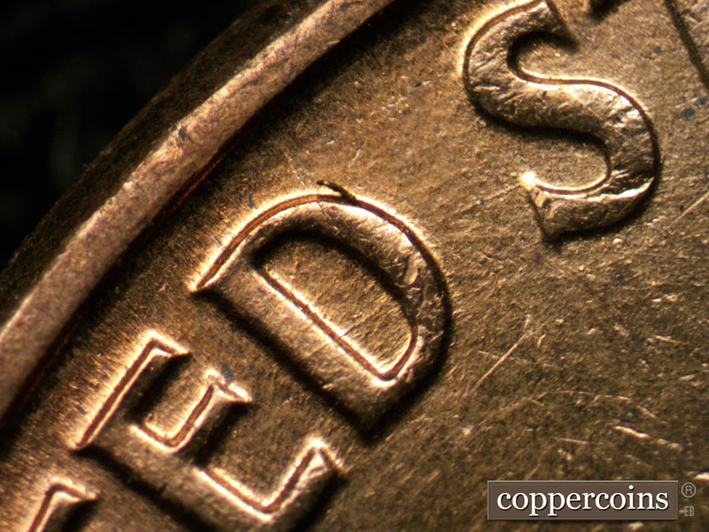 Die-stage B marker on 1960D•1MM•207 (1960 Repunched Mint Mark).