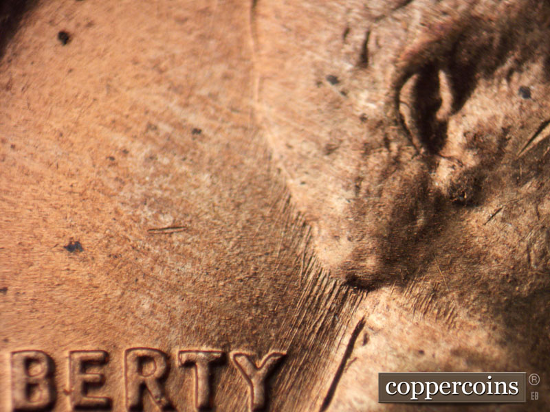 Die-stage B marker on 1960D•1MM•210 (1960 Repunched Mint Mark).