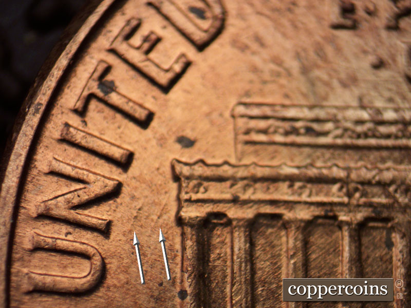 Die-stage B marker on 1960D•1MM•210 (1960 Repunched Mint Mark).