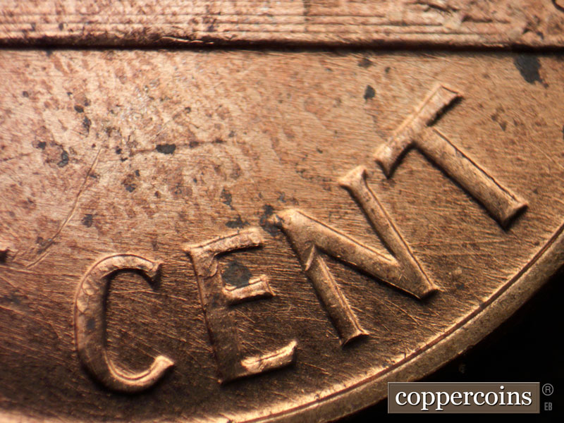 Die-stage B marker on 1960D•1MM•210 (1960 Repunched Mint Mark).