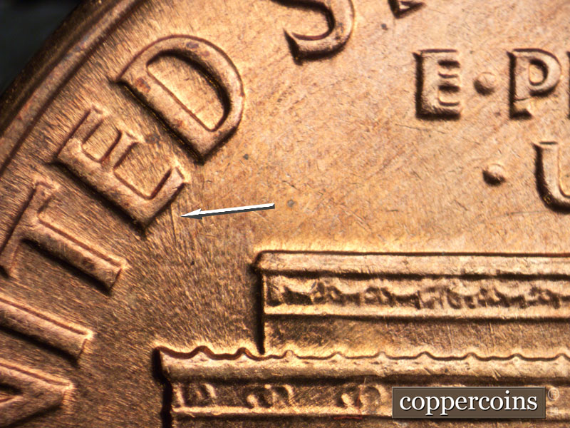 Die-stage B marker on 1960D•1MM•211 (1960 Repunched Mint Mark).