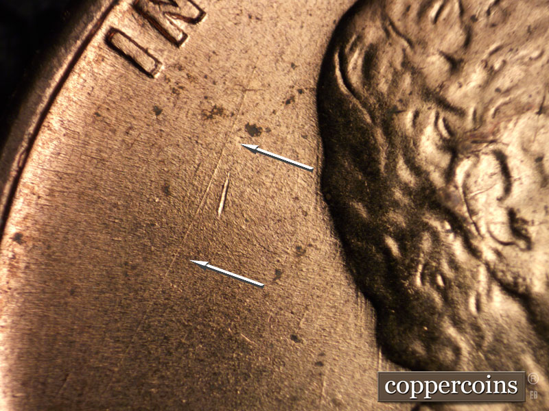 Die-stage B marker on 1960D•1MM•214 (1960 Repunched Mint Mark).