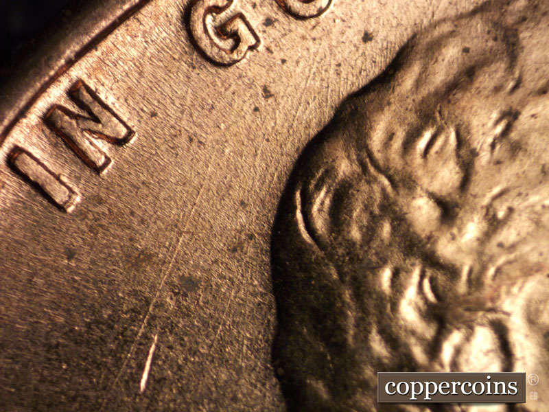 Die-stage B marker on 1960D•1MM•214 (1960 Repunched Mint Mark).