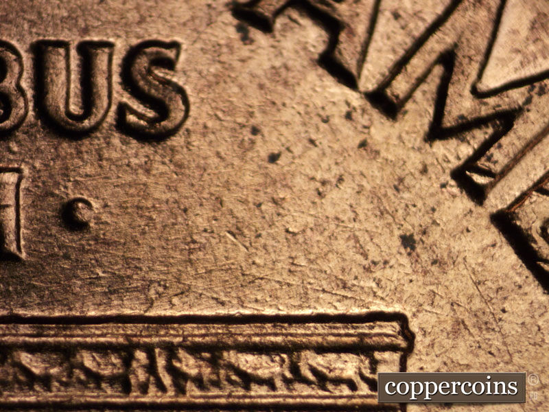 Die-stage B marker on 1960D•1MM•214 (1960 Repunched Mint Mark).