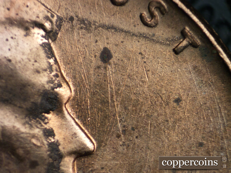 Die-stage B marker on 1960D•1MM•215 (1960 Repunched Mint Mark).
