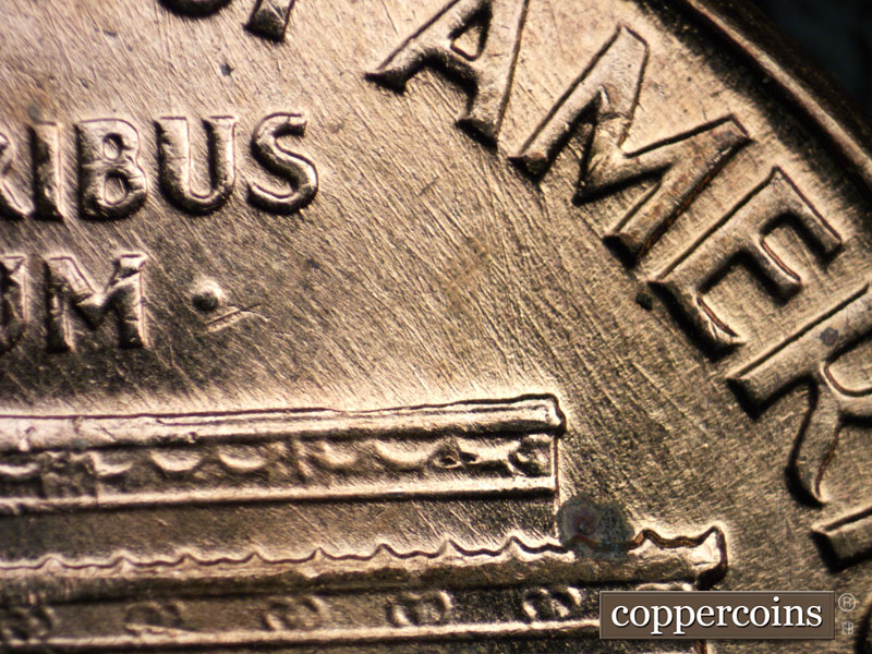 Die-stage B marker on 1960D•1MM•215 (1960 Repunched Mint Mark).