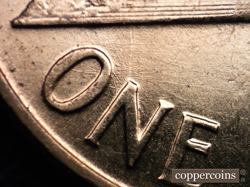 Die-stage B marker on 1960D•1MM•215 (1960 Repunched Mint Mark).
