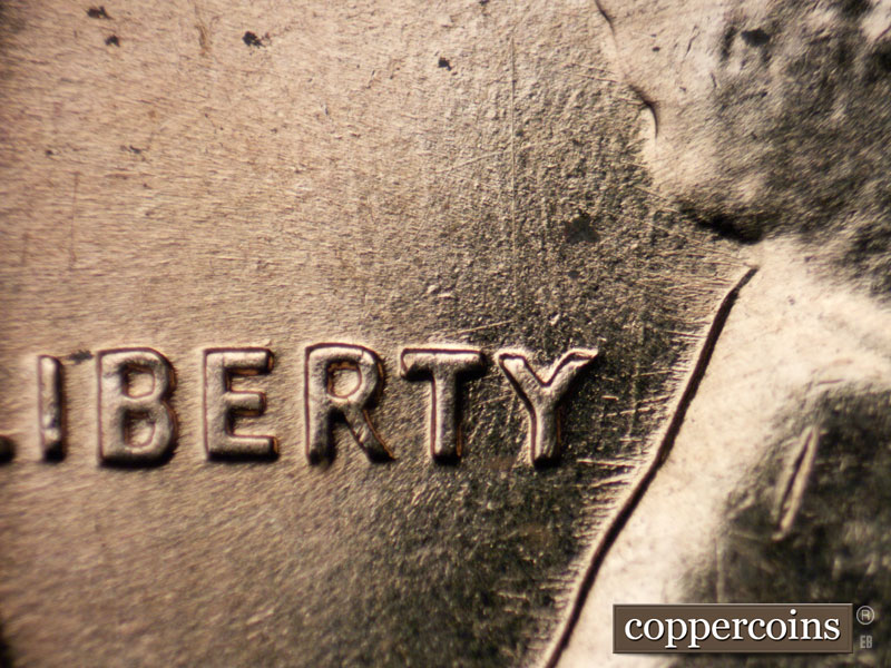 Die-stage B marker on 1960D•1MM•216 (1960 Repunched Mint Mark).