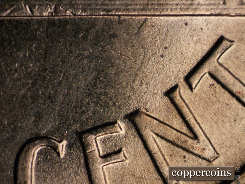 Die-stage B marker on 1960D•1MM•216 (1960 Repunched Mint Mark).