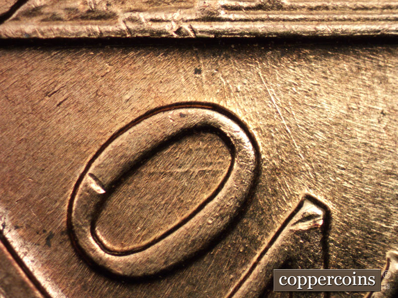 Die-stage B marker on 1960D•1MM•218 (1960 Repunched Mint Mark).
