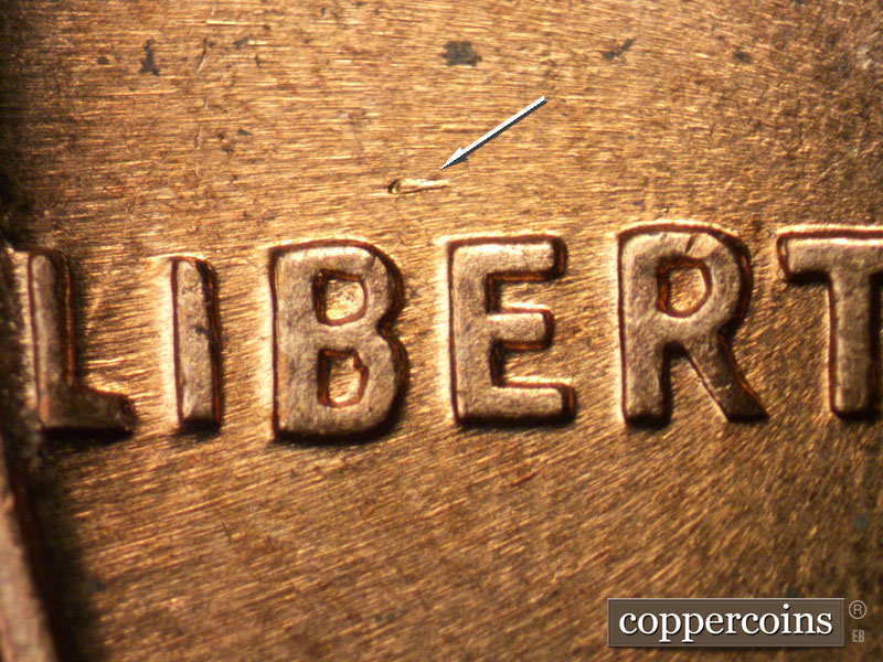 Die-stage B marker on 1960D•1MM•221 (1960 Repunched Mint Mark).