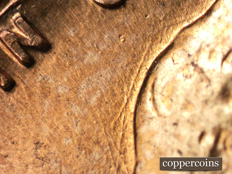 Die-stage B marker on 1960D•1MM•221 (1960 Repunched Mint Mark).