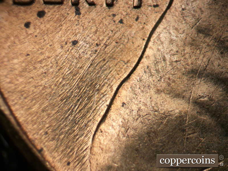 Die-stage B marker on 1960D•1MM•229 (1960 Repunched Mint Mark).